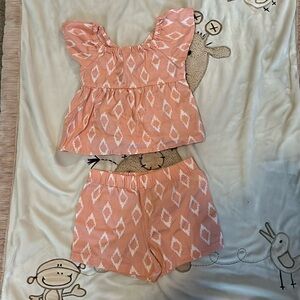 Peach top and bottom matching shorts set. 18 months. Carter’s